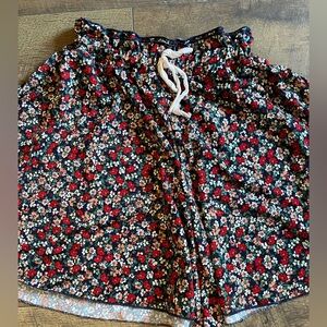 Floral shorts, flowy looks like skirt. Great condition